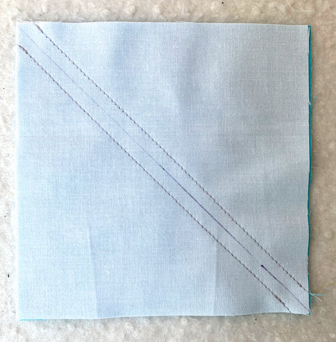 Stitch on both sides of the white line