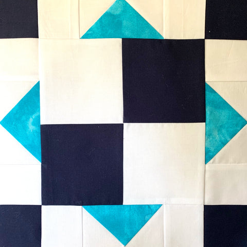 Chained Nine Patch Quilt Block in Navy, Teal, and White