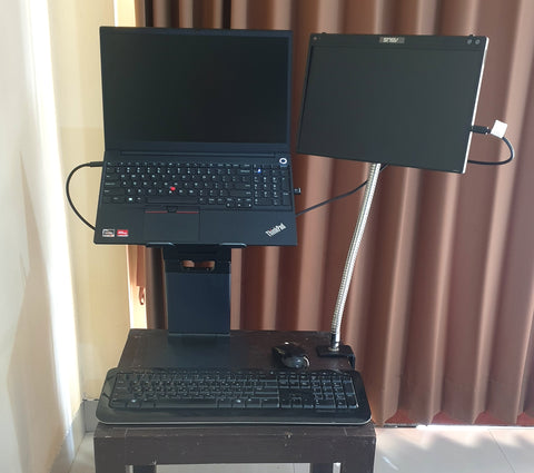 Portable monitor attached to table with Megaclamp, 18" Super-Duty flexible gooseneck arm and Ball Head