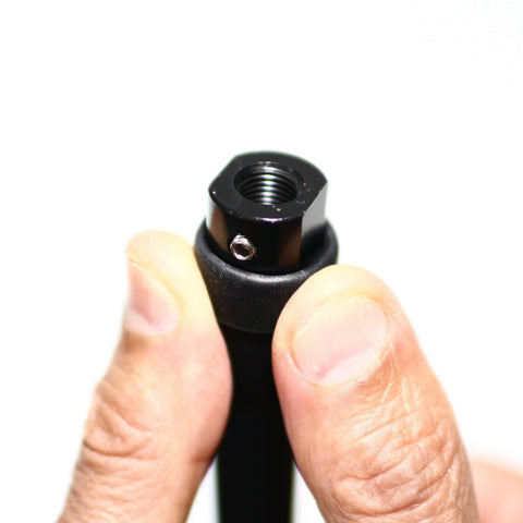 Use your thumbs to roll back the silicone covering and expose the end adapters