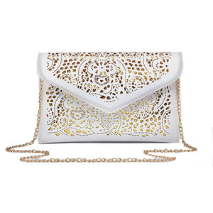 white and gold clutch bag