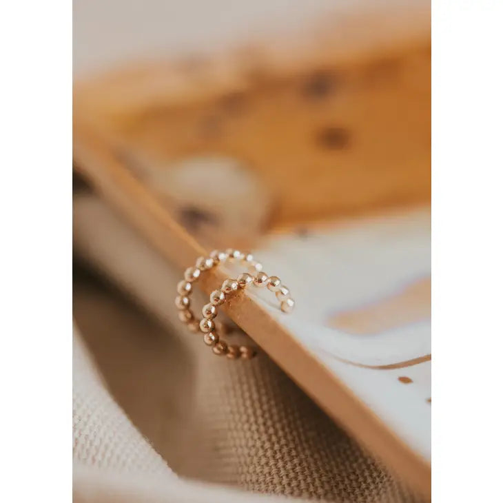 Beaded Huggie Hoops by Hello Adorn