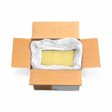 bulk yellow sour sugar candy in a box