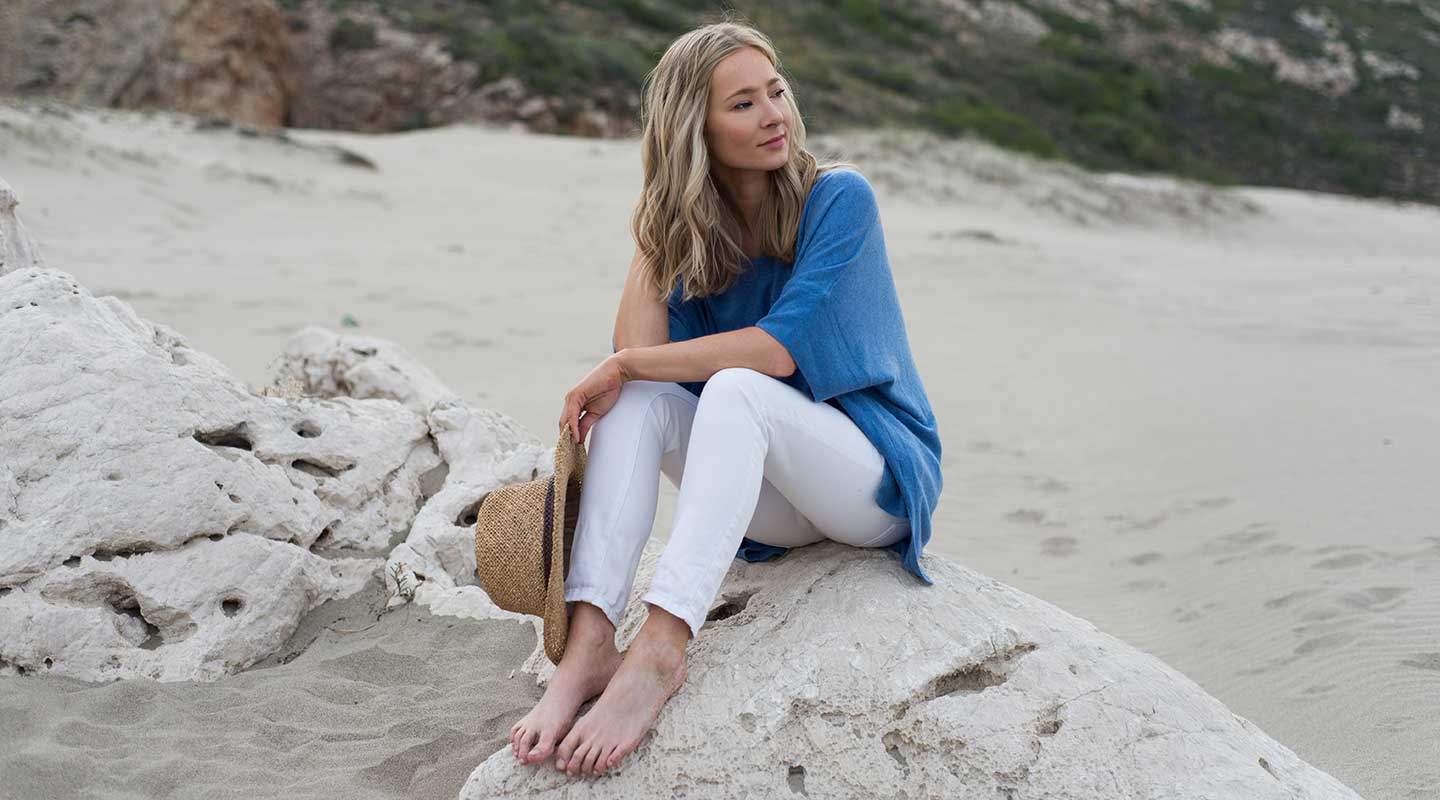 blue short sleeve cashmere kimono worn on the beach