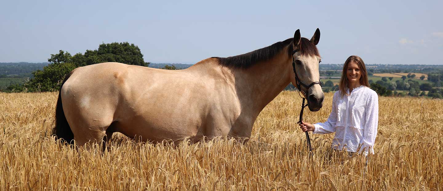 charlotte and her horse jake preparing for the horse trial championships.jpg