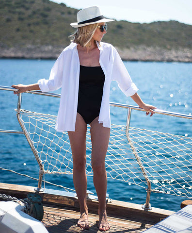 oversized white cotton shirt worn on boat in summer