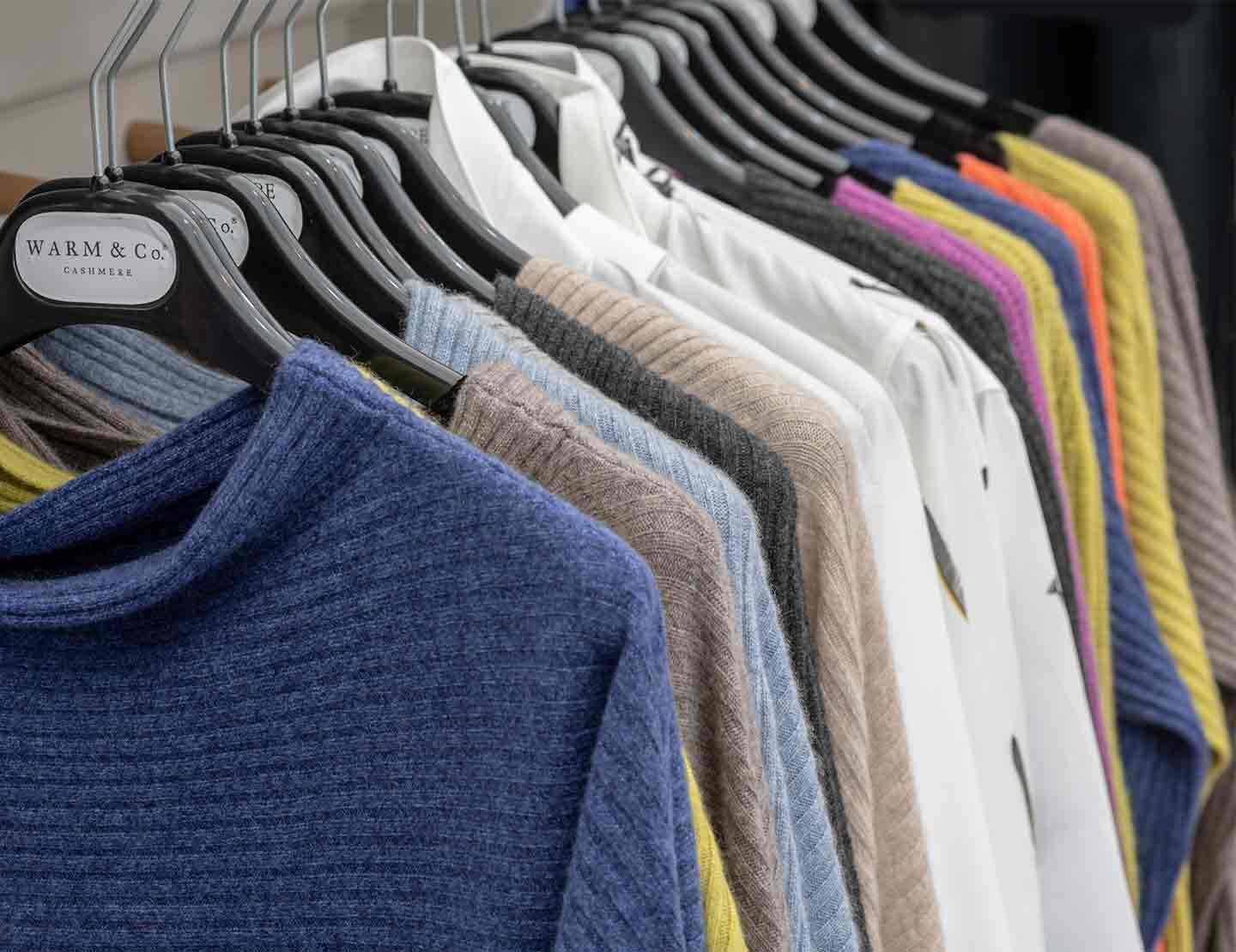 photo of rail of cashmere jumpers