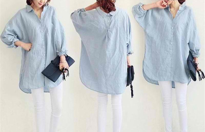 Chic oversized light blue linen shirt with white pants.