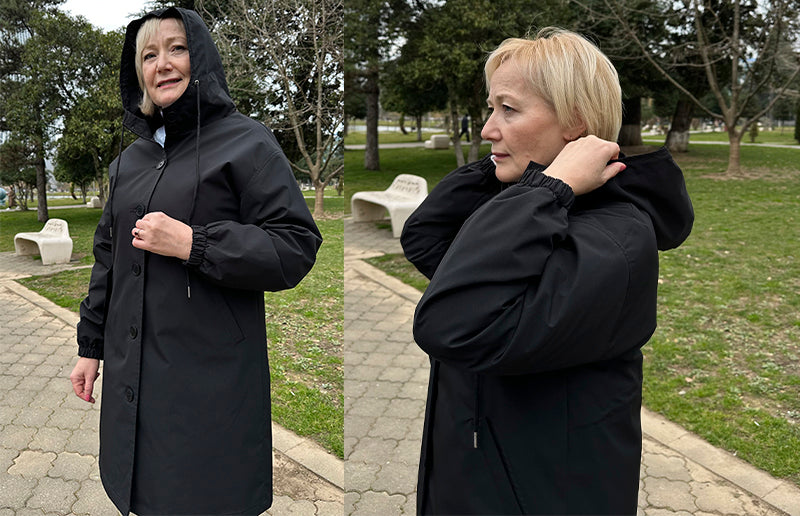 a woman in her 50's wearing a water resistant oversized windbreaker jacket