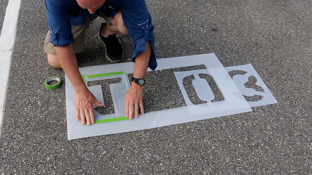 Turn third digit upside down and affix with Frog Tape
