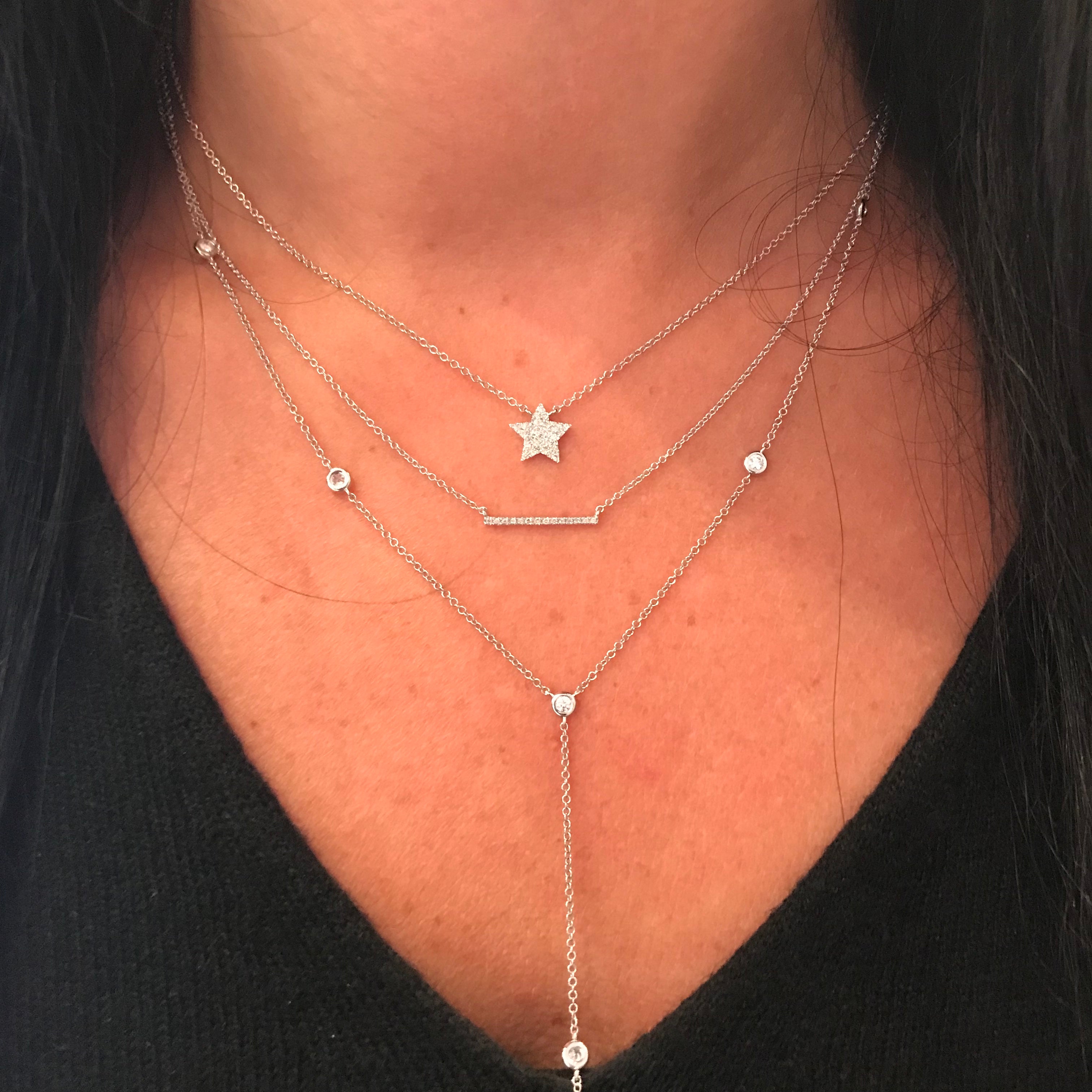 thin necklace with small diamond