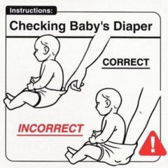 checking baby's diaper with finger