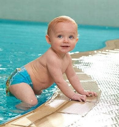 baby in disposable swim nappy