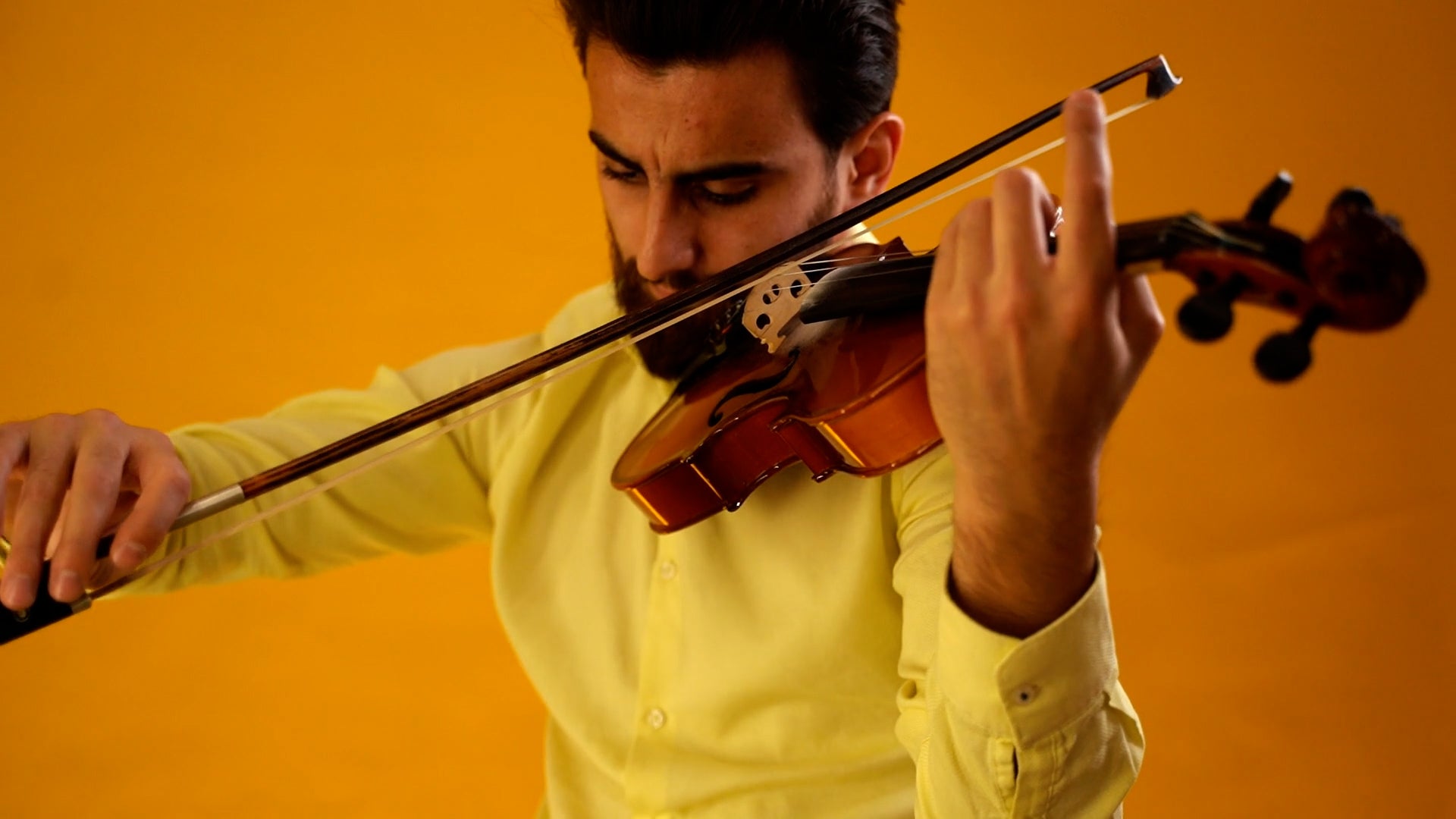 man playing violin