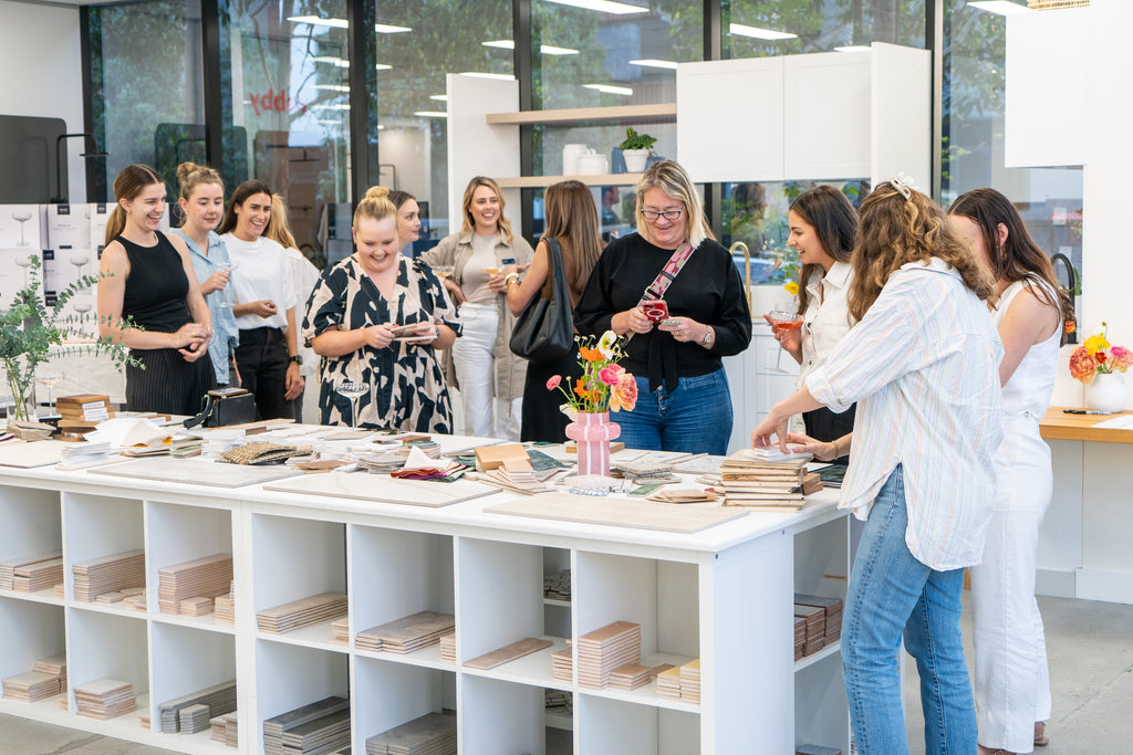 A group of attendees doing their flat lays at TileCloud HQ.