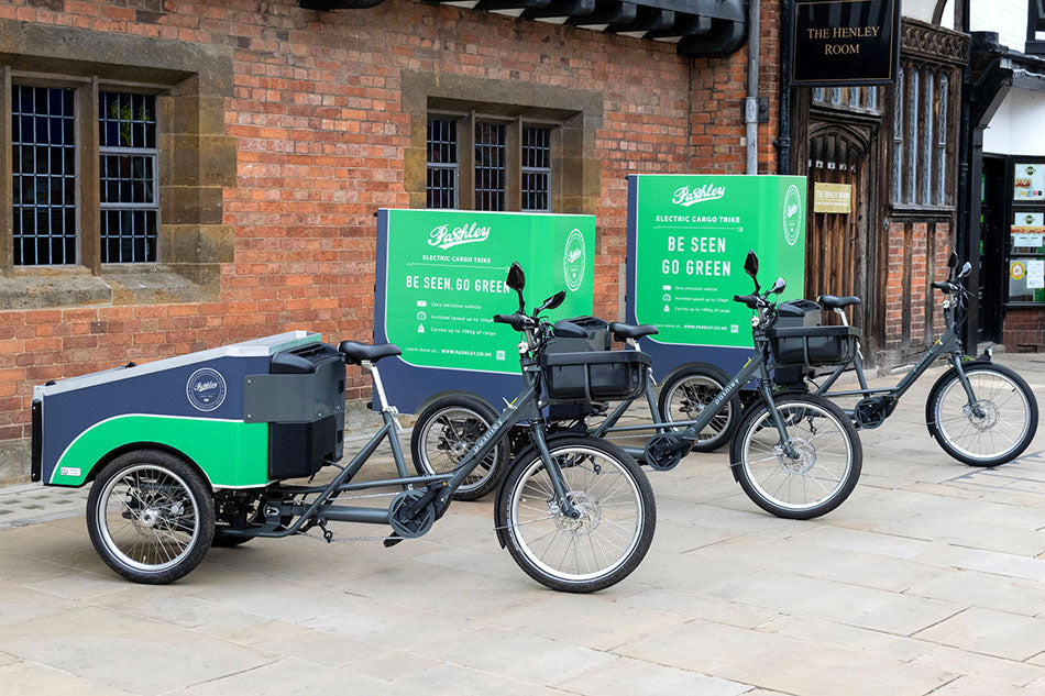 Showing the three sized rear cargo boxes available for the Pashley electric cargo trike.