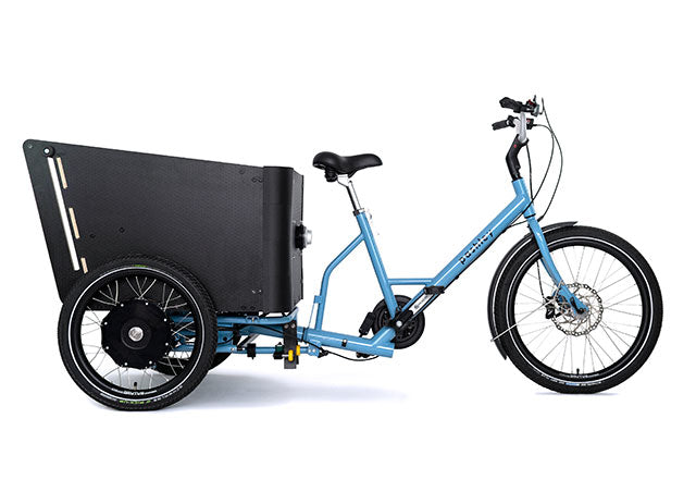 Side view of electric, chainless cargo trike with large black rear cargo box, on a white background.