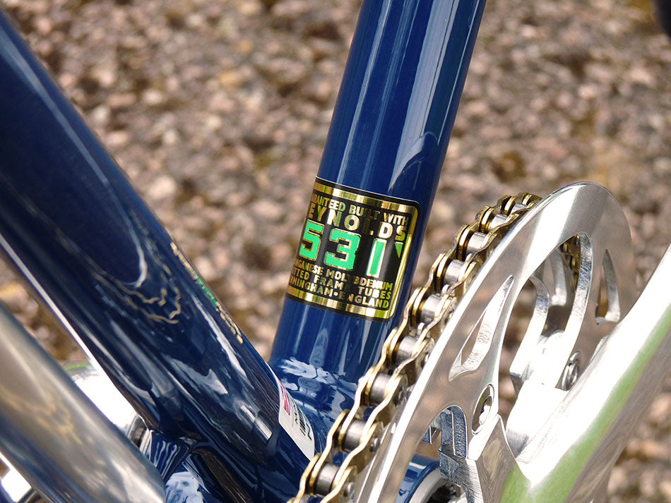A close-up of the Reynolds 531 steel sticker on the inner downtube of the bike frame.