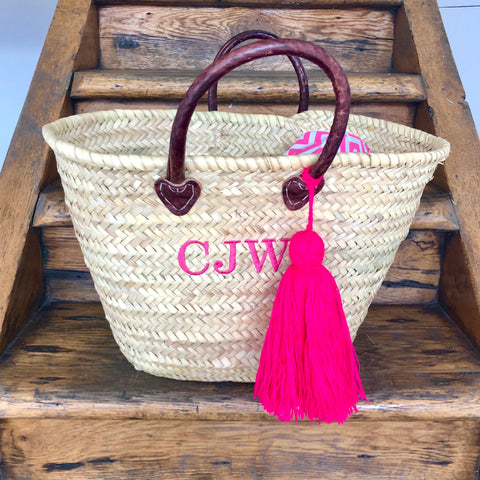 Straw basket with embroidered initials
