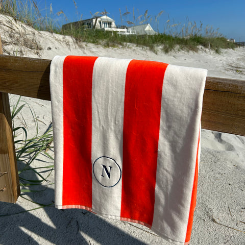 Striped beach towel with embroidered monogram