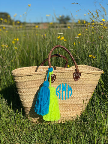 Straw basket with embroidered initials