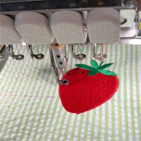 Embroidered strawberry motif