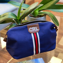 monogrammed navy walton wash bag with red stripe