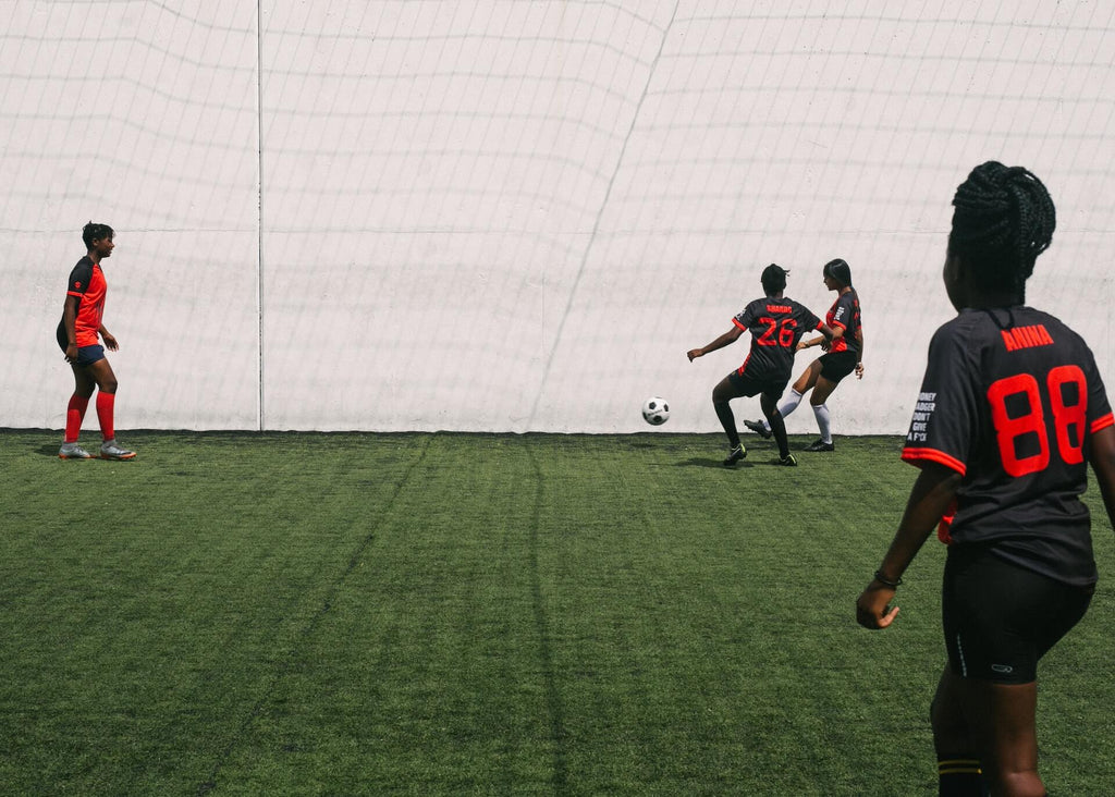 soccer players practicing on wall drills