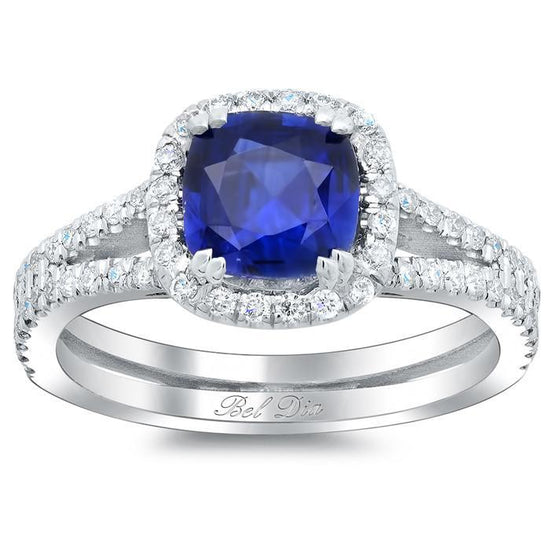 https://cdn.shopify.com/s/files/1/3002/0938/products/blue-sapphire-cushion-double-shank-halo-engagement-ring_image_550x.jpg?v=1553217798