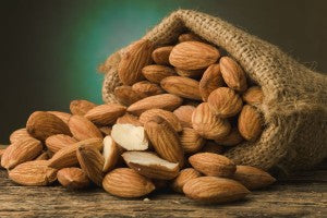 almonds_nuts_bag_burlap_pile_table_pic