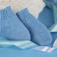 baby_boy_blue_clothing_socks_ribbon_pic