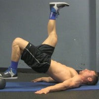 medicine_ball_hamstring_curls_workout_video_pic