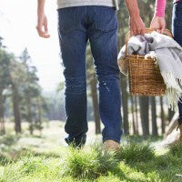 picnic_couple_happy_basket_blanket_spring_grass_field_trees_country_walk_pic