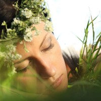 warm_woman_sleeping_nature_grass_outside_pic