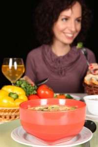 woman_eating_vegetables_soup_dinner_pic