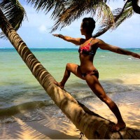 woman_grace_van_berkum_yoga_pose_tree_tropical_beach_ocean_water_pic