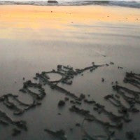write_sand_words_beach_sunrise_water_pic