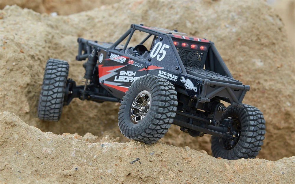 UDIRC UCX2405 Pro RC Car close-up of high-traction tires and suspension