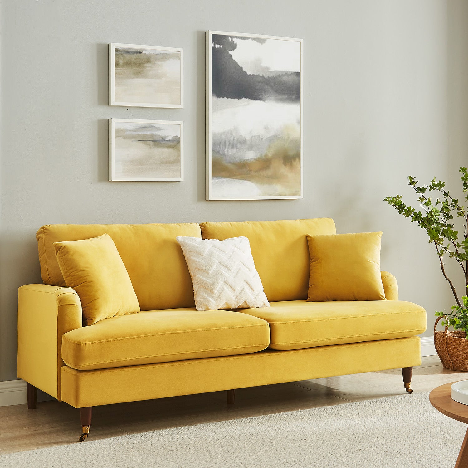 Brigette 3-Seater Mustard Velvet Sofa with Antique Brass Castor Legs