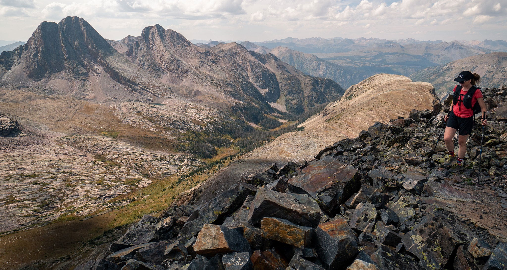 Hiker on a rocky mountain top