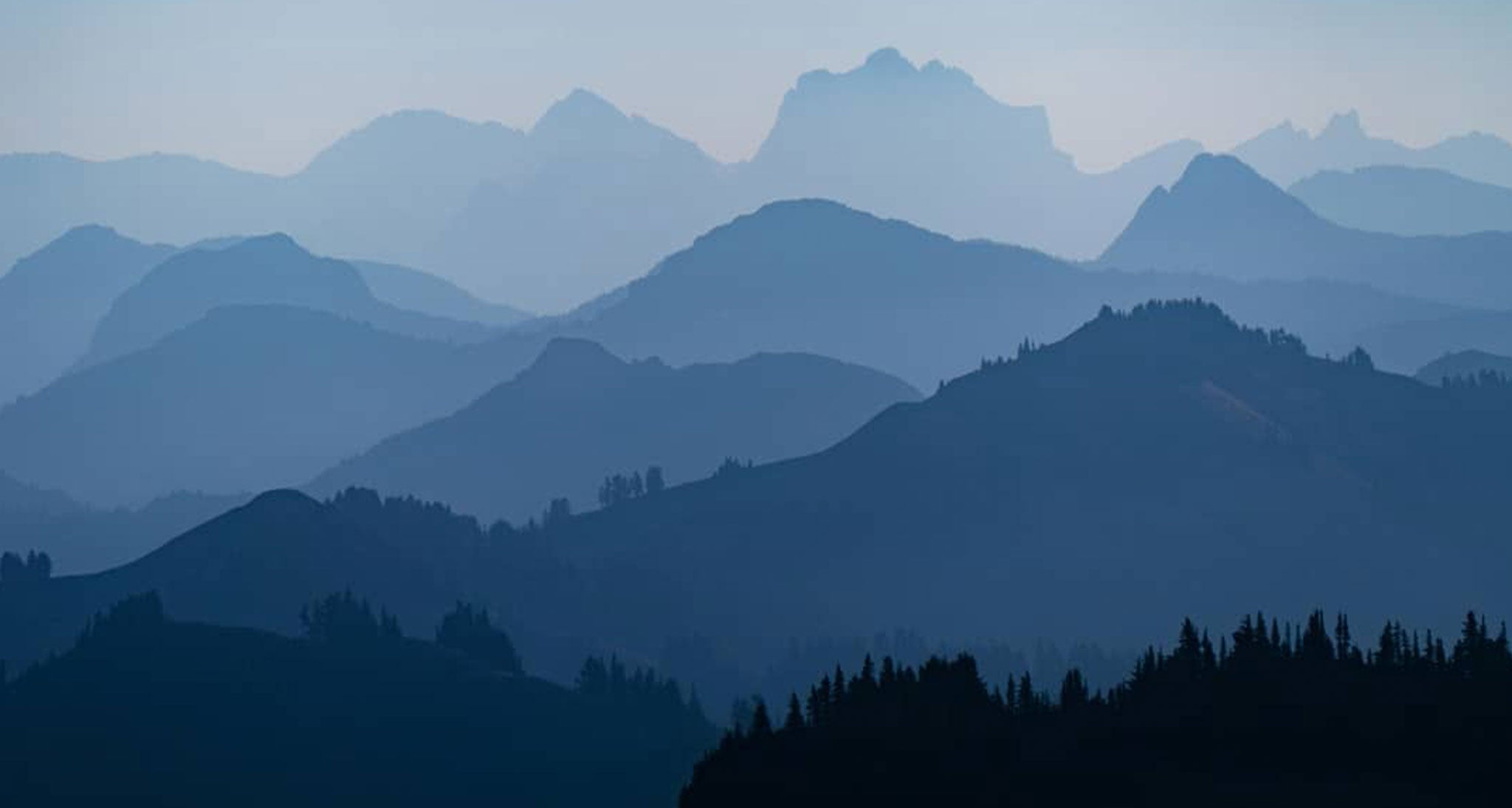Blue-ish hued mountain ranges
