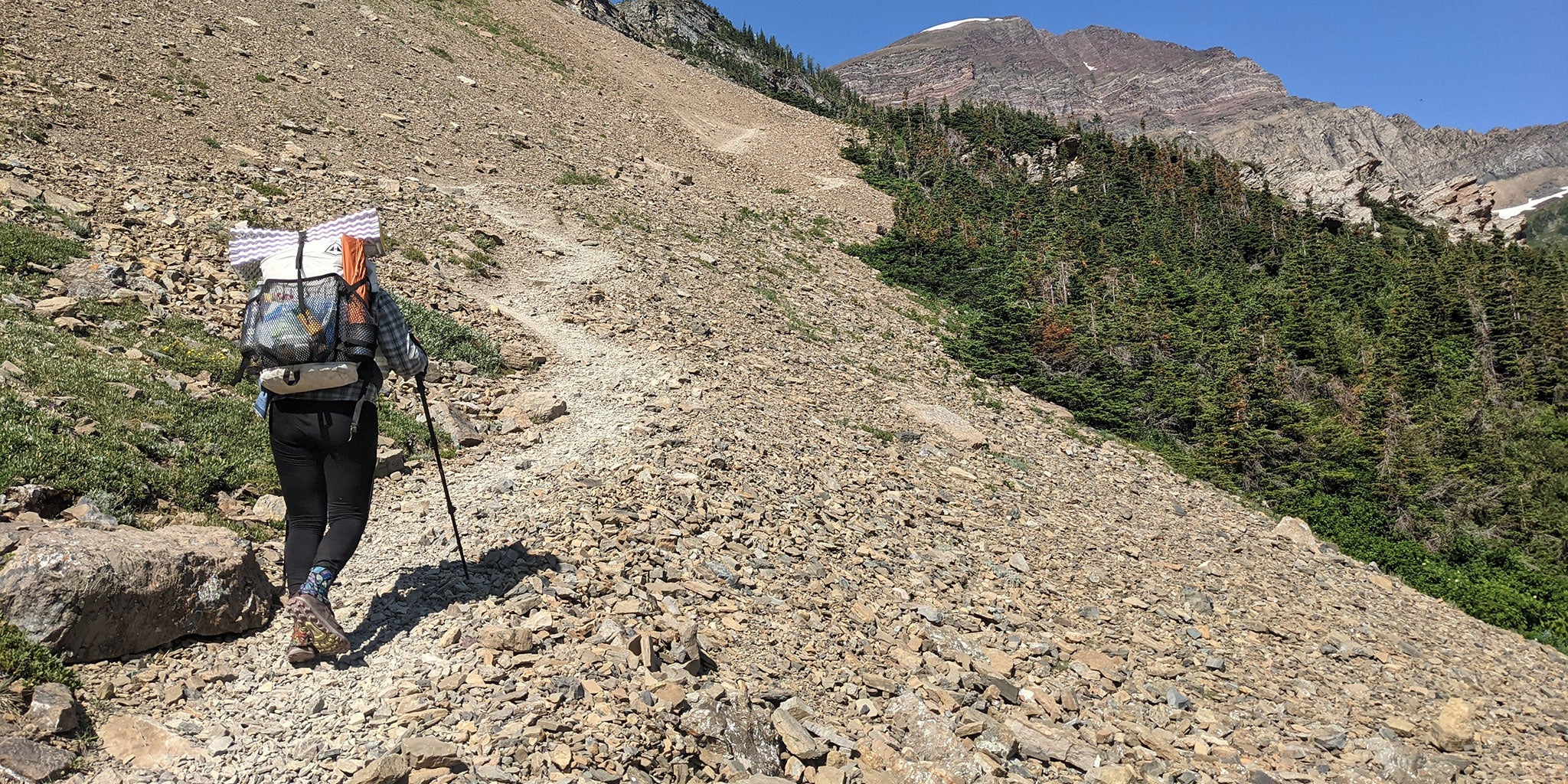 Hiking up a steep and loose scree field