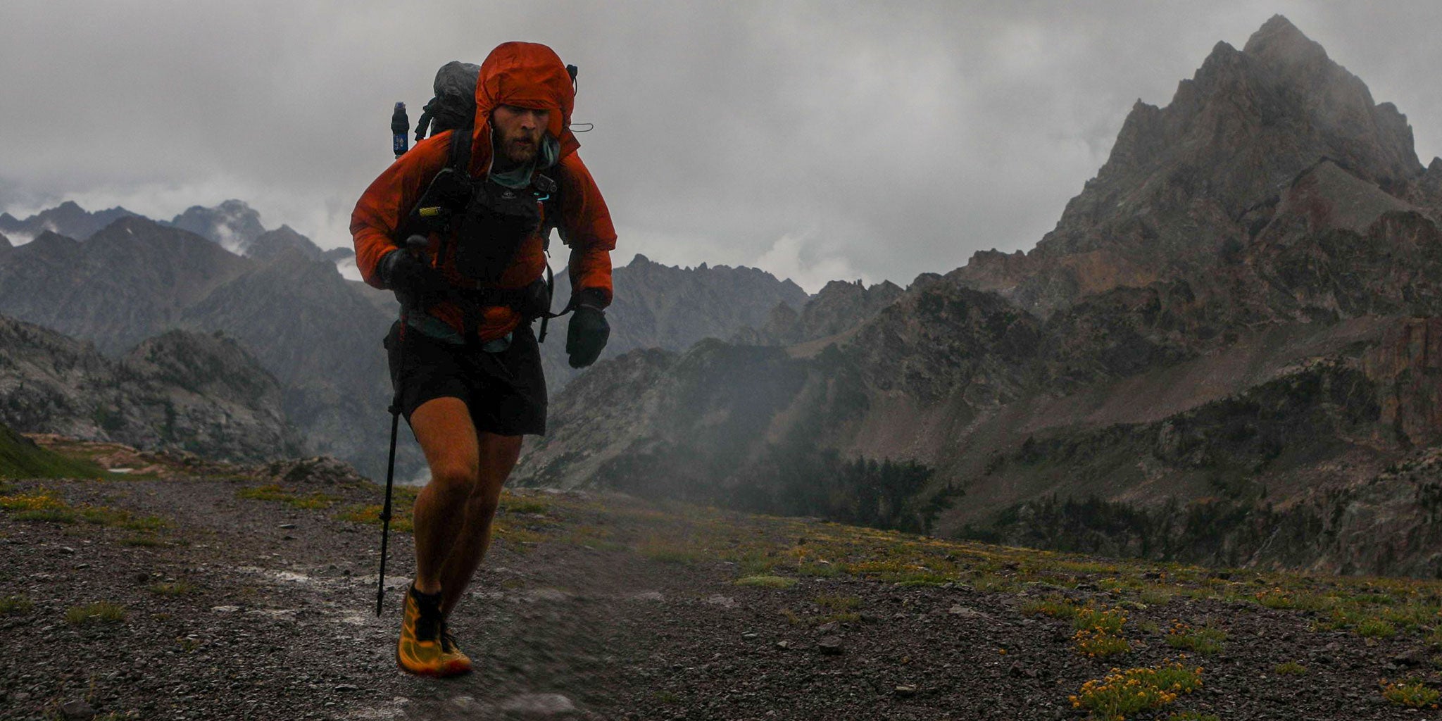 Trail runner running through the mountains