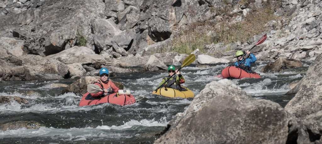 Three people Whitewater Packrafting