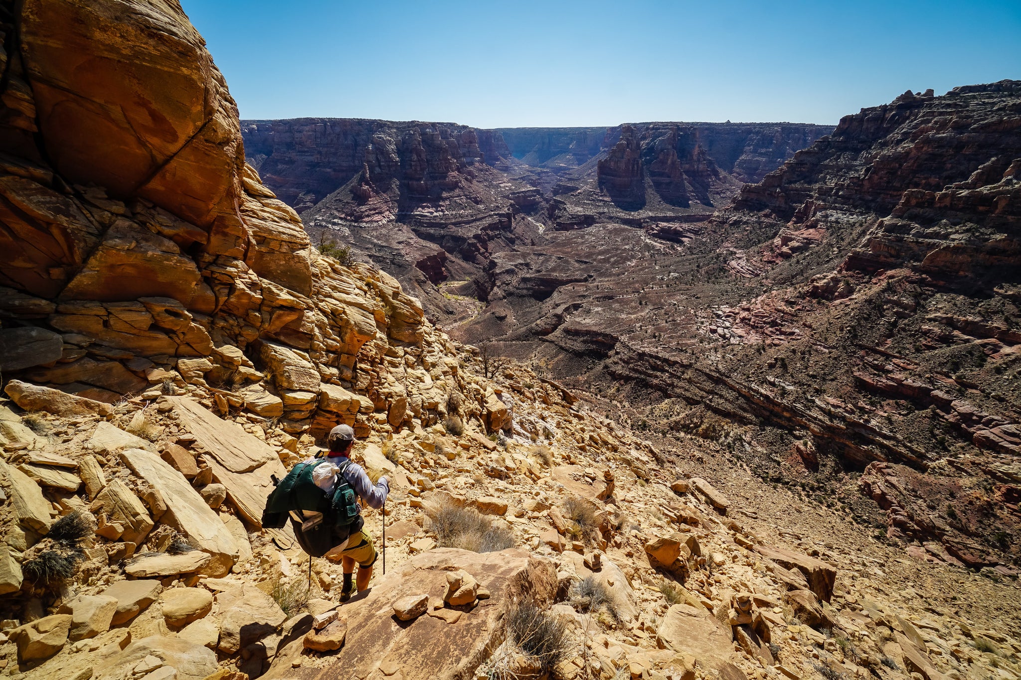 Hiker descending into the canyon