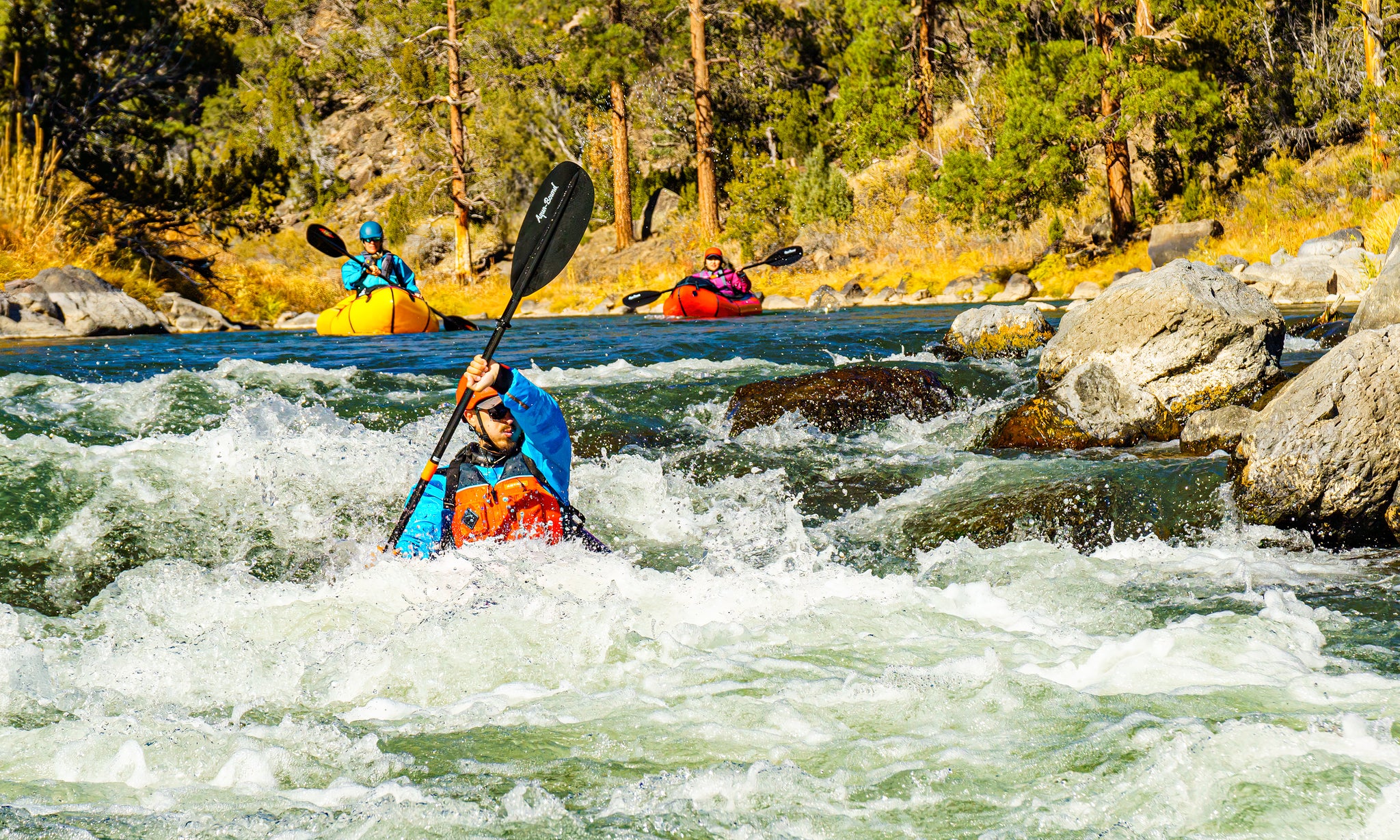 Pack rafting opens lots of possibilities to combine hiking, backpacking and river travel even on day trips like this one on the Taos Middle Box in Rio Grande del Norte National Monument in New Mexico. This was a simple 2-mile hike-in, and a 10-mile paddle sprinkled with a few class II+/III rapids. Working with multiple subjects is more challenging design wise than working with one and I purposely look for situations where I can show a group adventure. I love to echo subjects and colors throughout my compositions. As usual I keep my outfit simple and in a water proof and easily accessible bag. I also keep my camera set up and optimized for action photography, minimizing set-up time to craft shots like this.