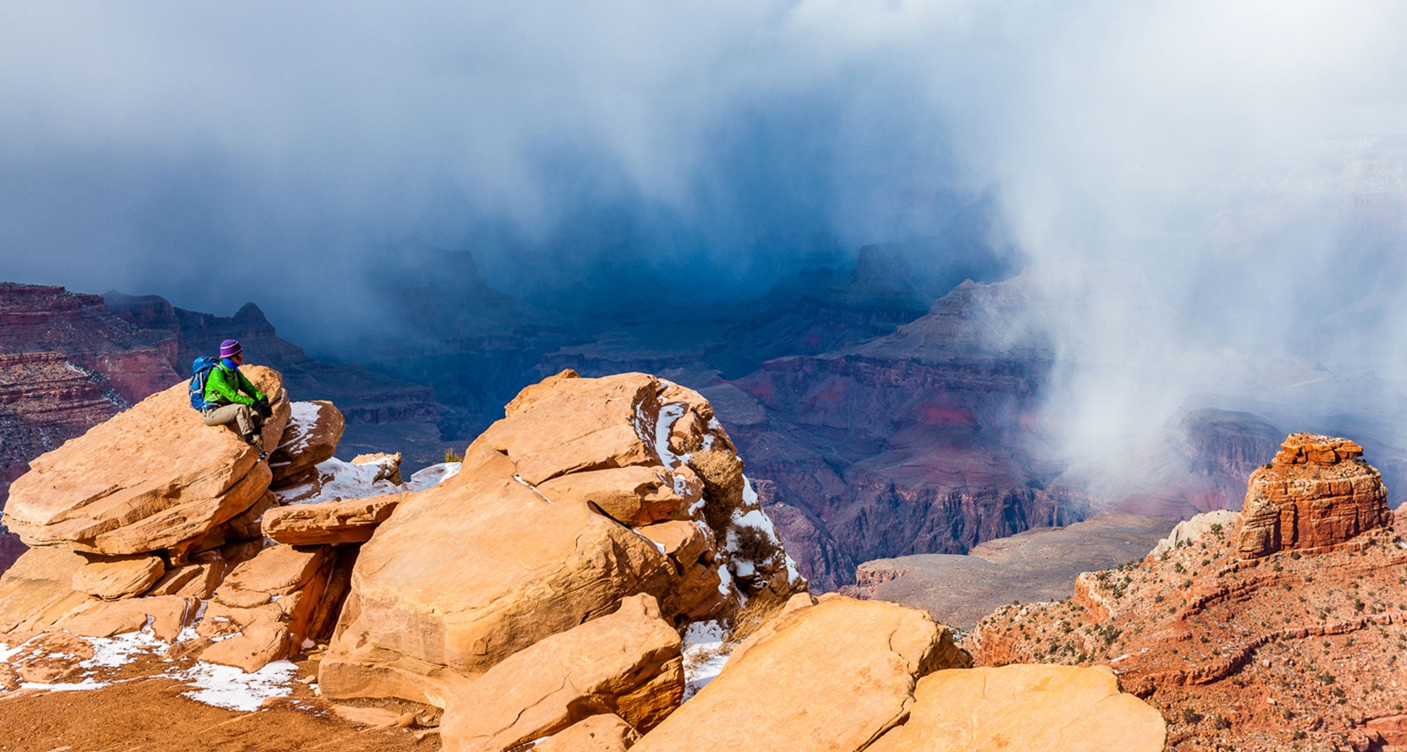 Cumulus clouds develop in the winter too as seen here over the Grand Canyon on the South Kaibab Trail.  This large cell is producing snowshoers seen by the white ragged shafts.  The cellular nature of the cloud base and the fact that snow started and stopped pretty abruptly several times that day is characteristic of cumulus clouds and showery precipitation.