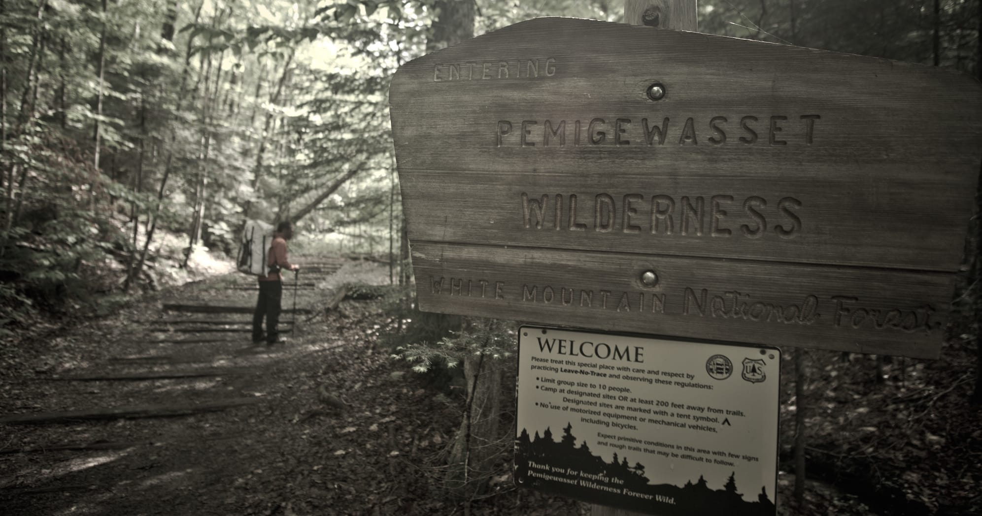 Wooden sign for Pemigewaset Wilderness in New Hampshire