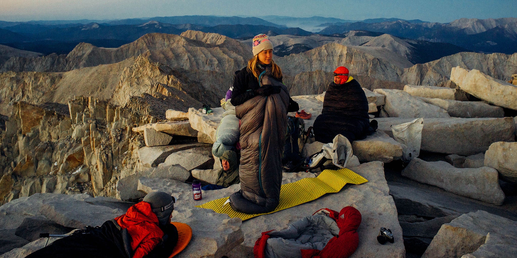 Hikers staying warm on the summit