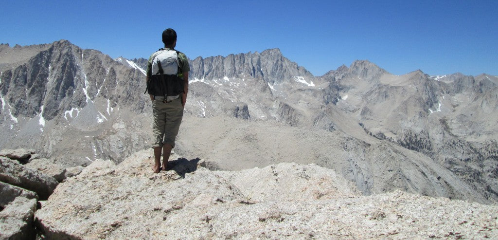 Hiker looking over mountains with Ultralight Southwest Pack